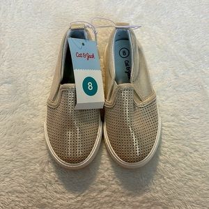 Cat & Jack size 8 children’s sneakers. In the color gold. Never worn.